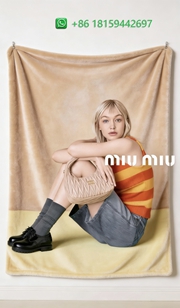 Miumiu Throw Blankets